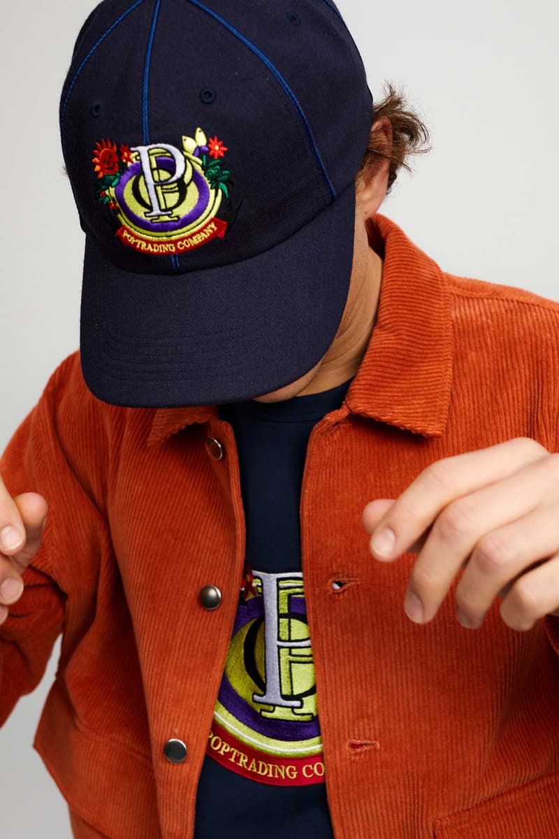 Pop Trading Company Debuts AW22 Collection tshirts jackets vests long sleeves pants hats white blue yellow orange grey black tan