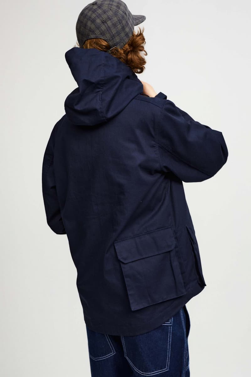 Pop Trading Company Debuts AW22 Collection tshirts jackets vests long sleeves pants hats white blue yellow orange grey black tan