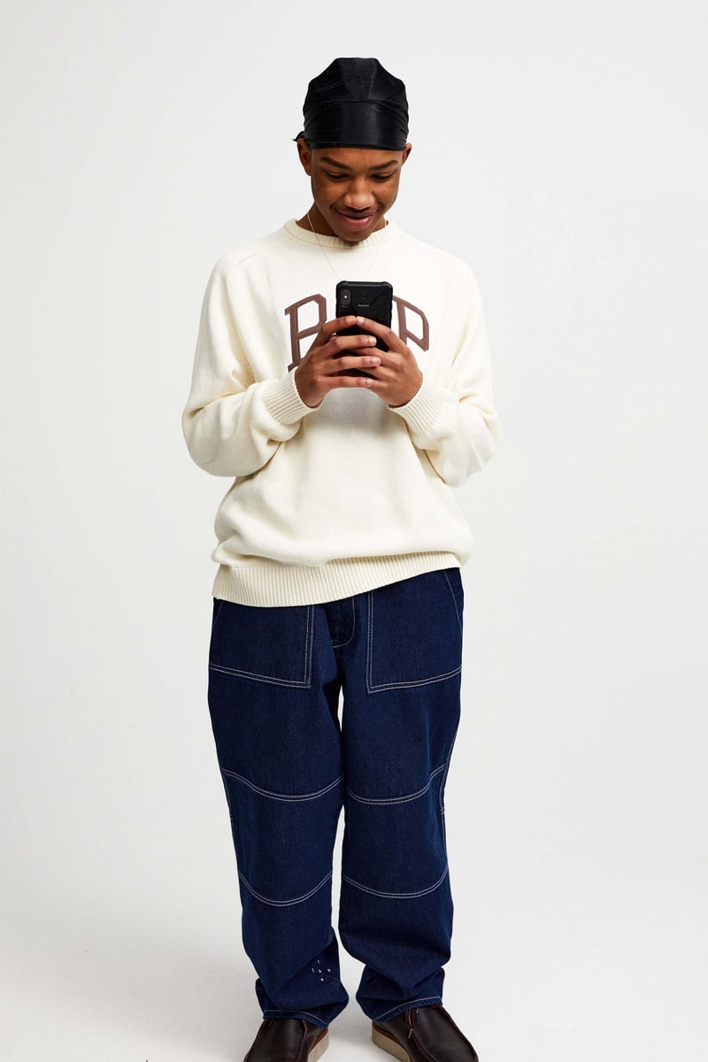 Pop Trading Company Debuts AW22 Collection tshirts jackets vests long sleeves pants hats white blue yellow orange grey black tan