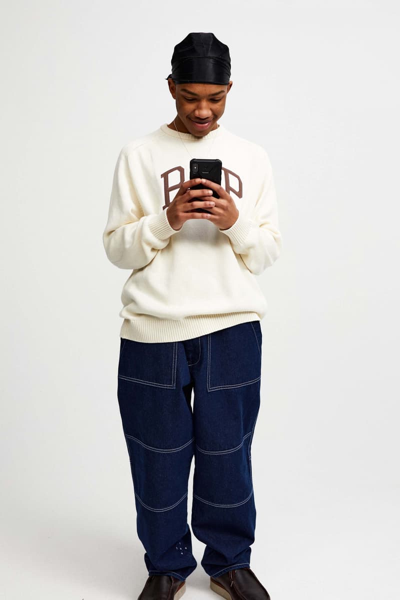 Pop Trading Company Debuts AW22 Collection tshirts jackets vests long sleeves pants hats white blue yellow orange grey black tan