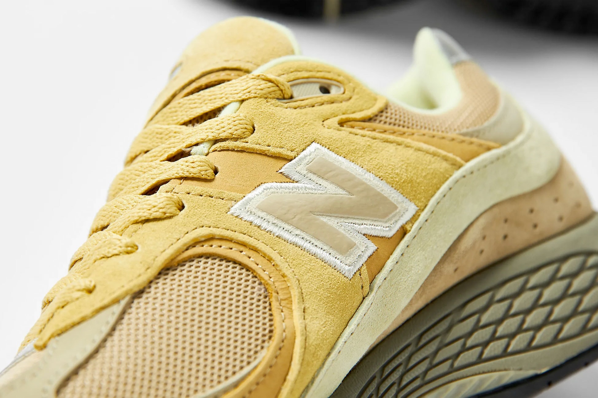 auralee tokyo new balance 2002r insole branding suede vintage muted green yellow sail white release info date price september 9