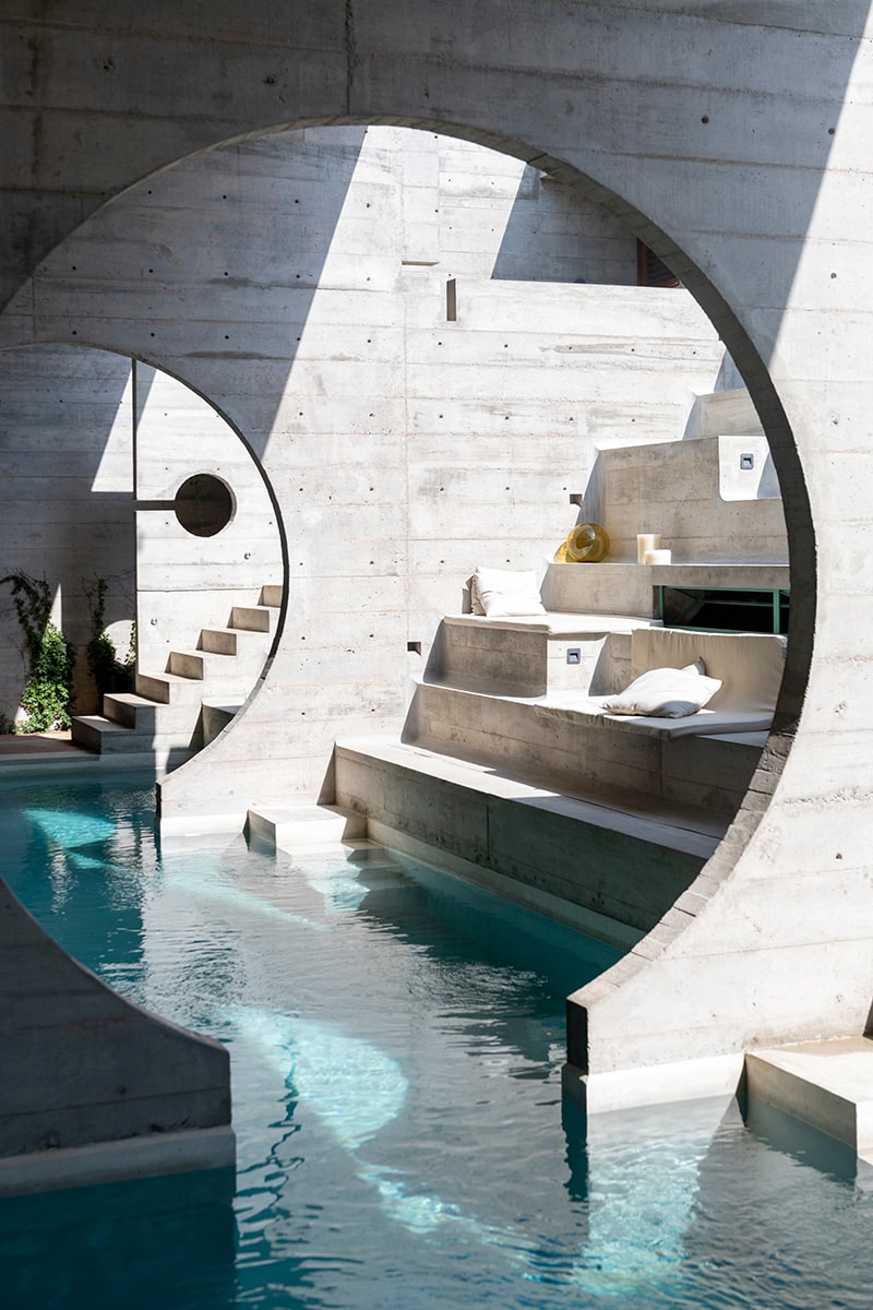 A Vaulted Infinity Pool Runs Throughout the 