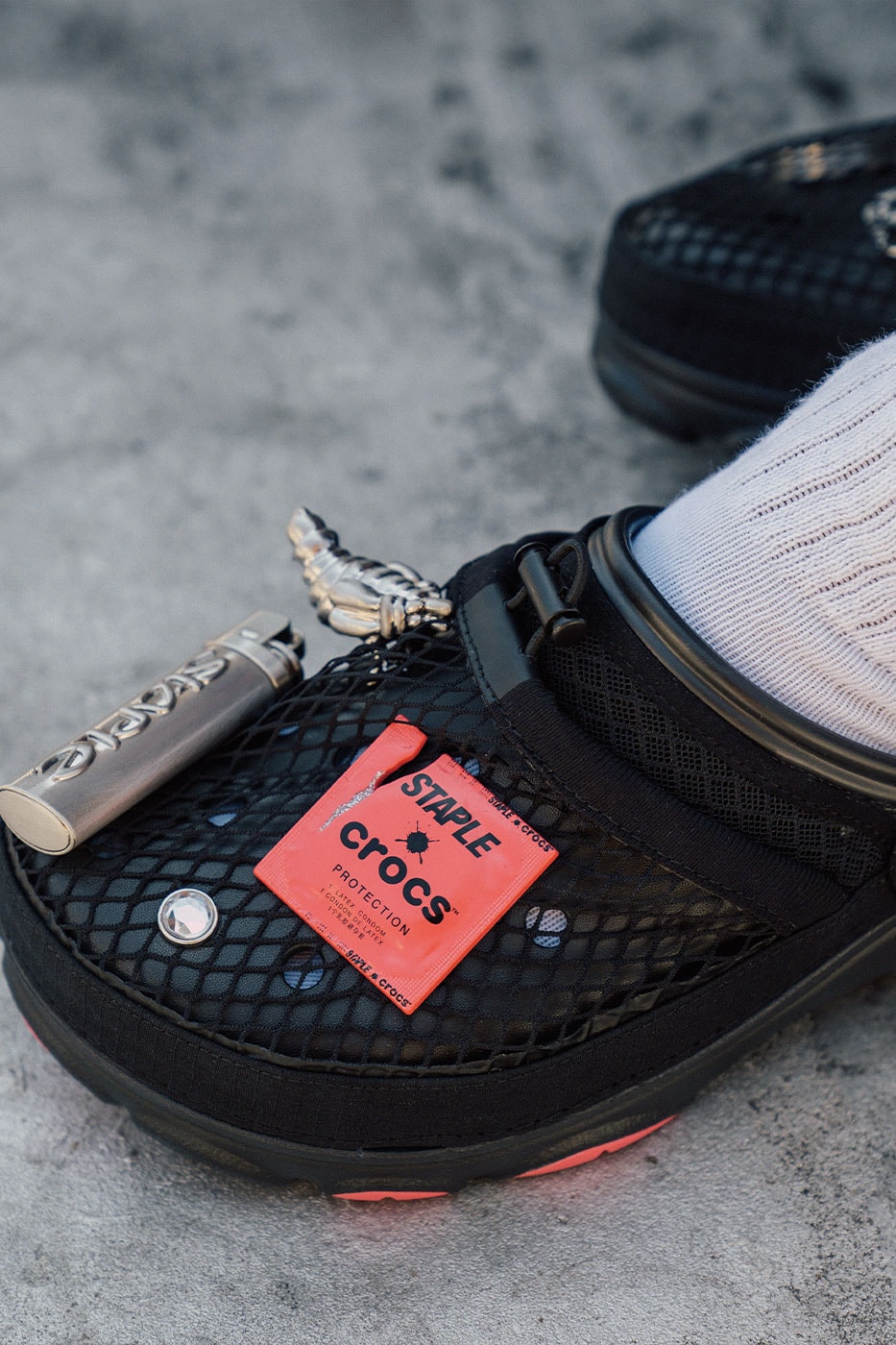 Crocs Joins Forces With STAPLE for Second Homing Pigeon Collab streetwear jeff staple jeffstaple clogs varsity jacket condom jibbitz lighter 