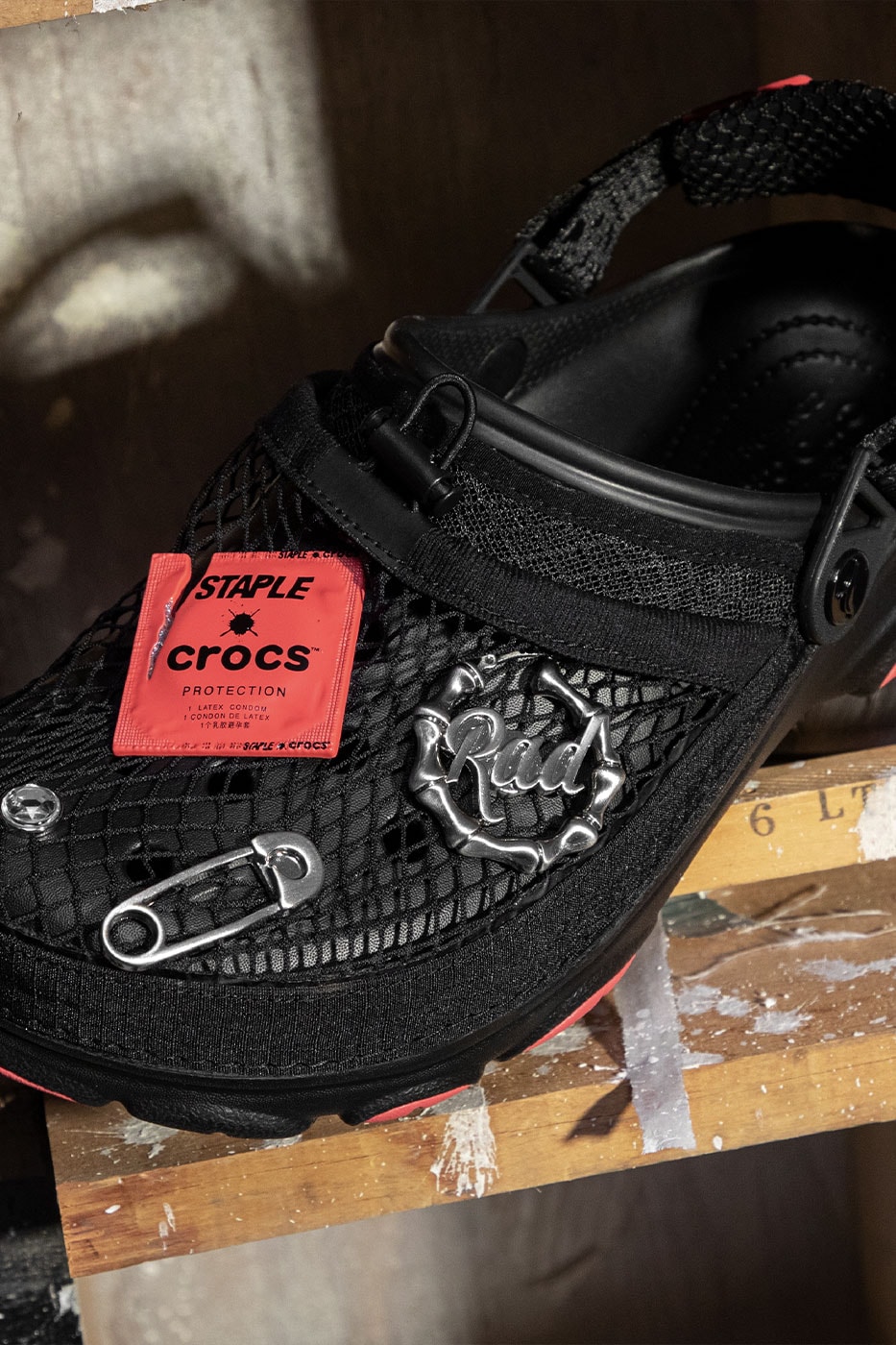 Crocs Joins Forces With STAPLE for Second Homing Pigeon Collab streetwear jeff staple jeffstaple clogs varsity jacket condom jibbitz lighter 