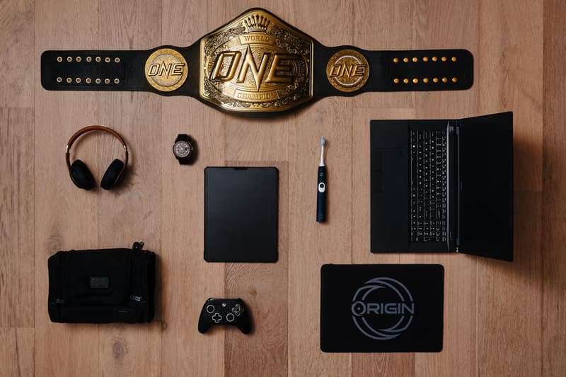 Demetrious Johnson Essentials One Championship Belt rolex onefc beats phillips sonicare toothbrush laptop tumi