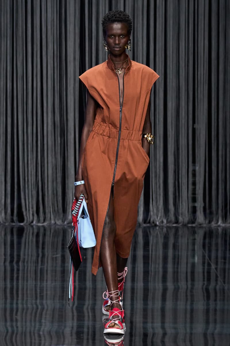 Ferrari Takes a Third Victory Lap Around the Fashion Circuit With SS23 Collection spring/summer 2023 milan fashion week race car teatro lirico juventus italian lvmh rocco iannone