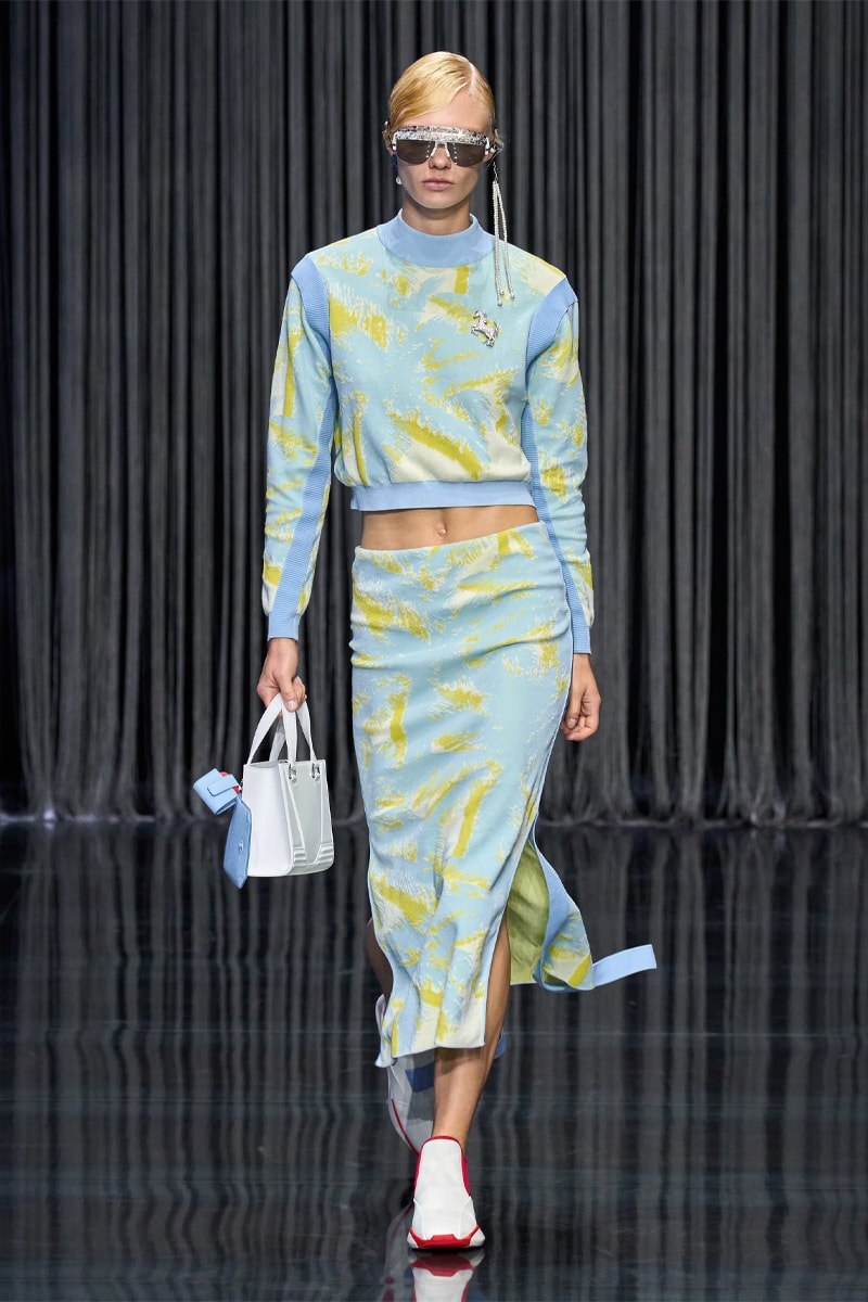 Ferrari Takes a Third Victory Lap Around the Fashion Circuit With SS23 Collection spring/summer 2023 milan fashion week race car teatro lirico juventus italian lvmh rocco iannone