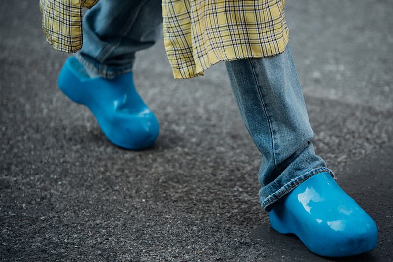 Here Are the Biggest Street Style Footwear Trends at Milan Fashion Week SS23 balenciaga asics nike foamposite comme des garcon mules clogs bottega rain boots crocks mule