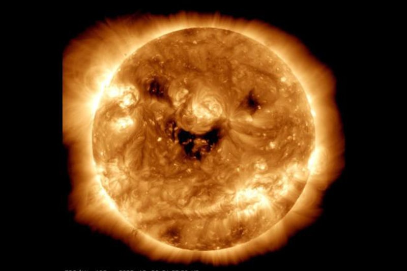 NASA Smiling Sun Coronal Holes UV Light View Space Observatory Image Photograph View First Look