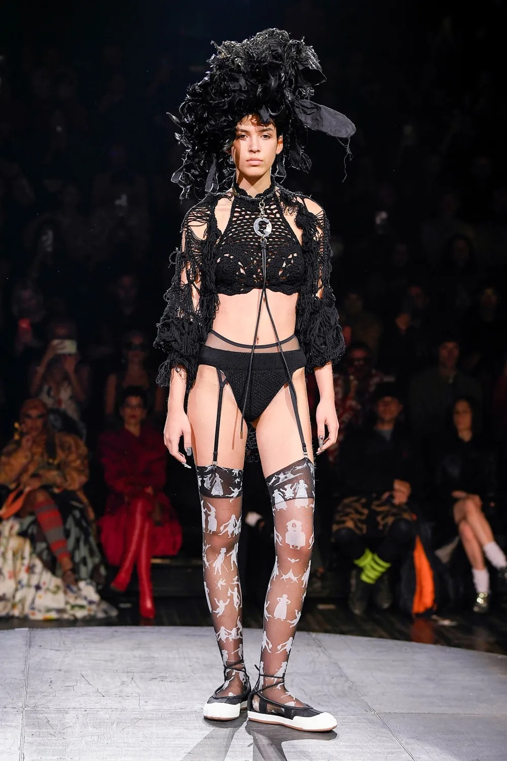 Image of MODEL DISPLAYS AN UNDERWEAR OUTFIT DESIGNED BY ANDRES