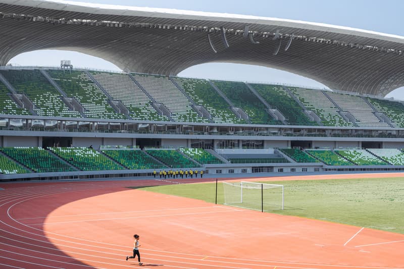 Mad architects ma yansong quzhou stadium quzhou sports park earth sheltered building zhejiang province shanghai 30000 