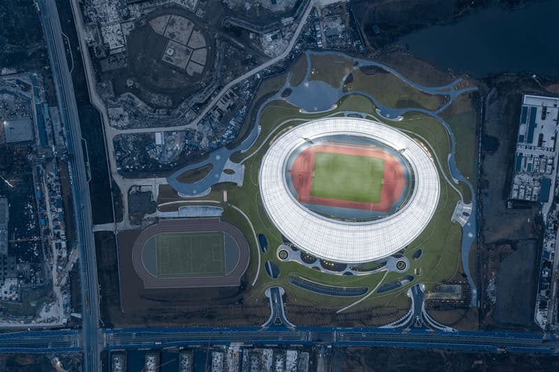 Mad architects ma yansong quzhou stadium quzhou sports park earth sheltered building zhejiang province shanghai 30000