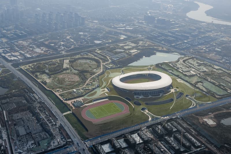 Mad architects ma yansong quzhou stadium quzhou sports park earth sheltered building zhejiang province shanghai 30000