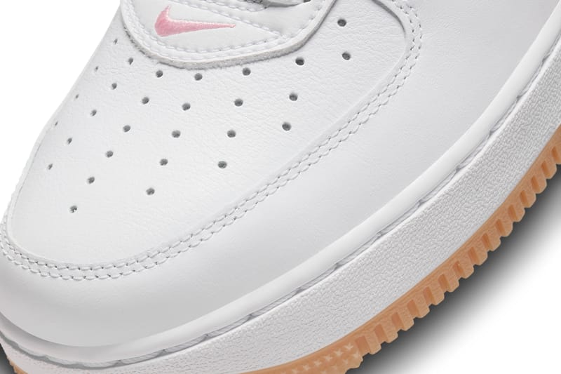 white nike with pink bottom