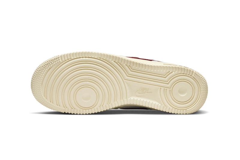 This Nike Air Force 1 Low Features Swoosh Pockets DV7584-001 team red summit white muslin photon dust sneakers af1
