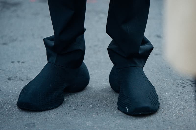 Here Are the Biggest Street Style Footwear Trends at Paris Fashion Week SS23 spring summer 2023 nike stussy nike air max balenciaga defender balmain blade runner mmw givenchy tk-360 