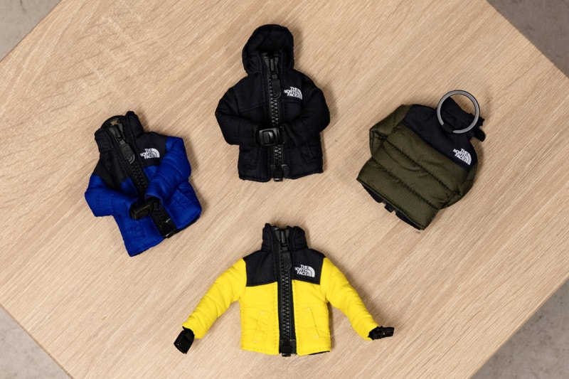 The North Face Face Introduces Mini Nuptse Jacket Keychains black yellow blue green gray sleeve buckle padded playful release info date price 