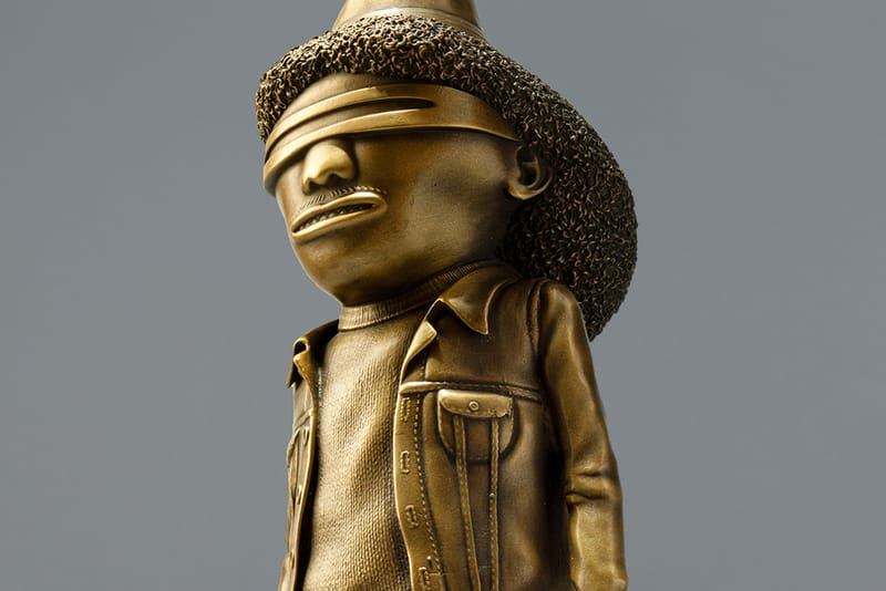 AllRightsReserved and OSGEMEOS Unveil 'The Giant' Bronze Sculpture