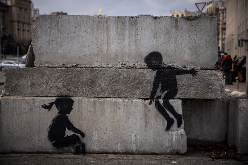 Banksy Confirms Seven New Murals in Ukraine kyiv Borodyanka irpin vladimir judo world taekwondo black belt putin gymnast ballerina rusian military vehicle