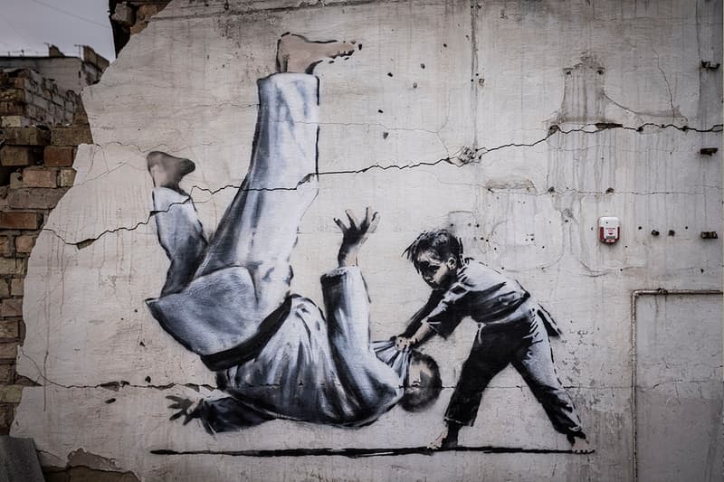 Banksy Confirms Seven New Murals in Ukraine kyiv Borodyanka irpin vladimir judo world taekwondo black belt putin gymnast ballerina rusian military vehicle