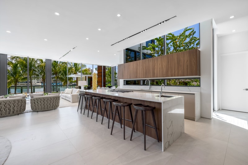 $16.3 Million usd Allison Island Miami Home purchase French insurance broker Laurent Pascale Ouazana house rap hip-hop