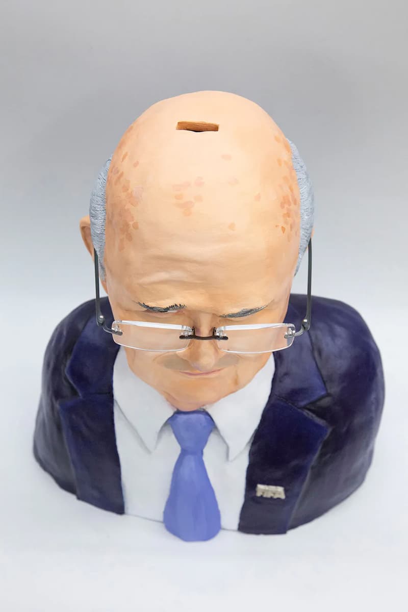 sepp blatter fifa piggy bank sculpture blatta o plomo world cup 2022 qatar corruption charity release date info phots price store list buying guide