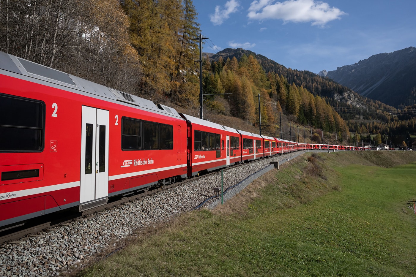 worlds longest train appears swiss alps 1905 meters 1 9 km 1 18 mile  albula line unesco world heritage site switzerland 