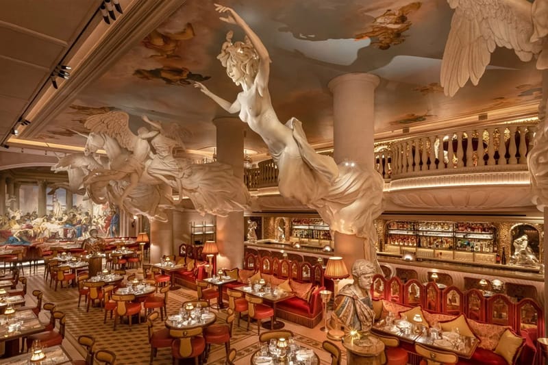 Damien Hirst's Sculptures Peek Through the Clouds at Bacchanalia London