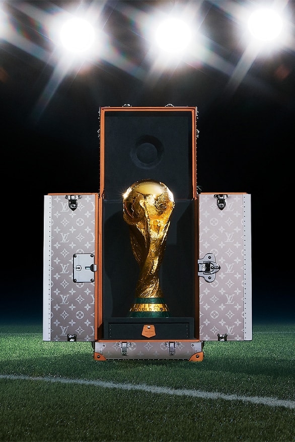 Fans baffled as World Cup trophy arrives in a LOUIS VUITTON case ahead of  the final