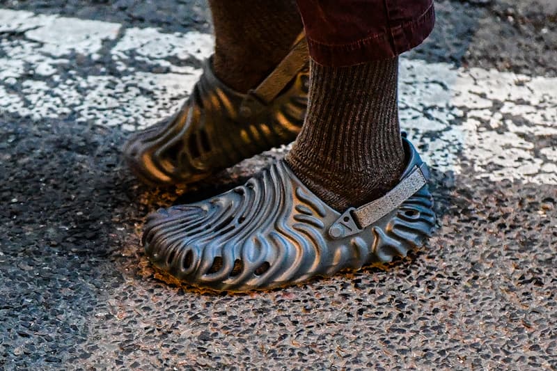 Biggest Street Style Footwear Trends at Men's Paris Fashion Week FW23 sacai nike adidas samba ebay travis scott jacquemus pleasures doc martin loafers nike sb dunk sacai vaporwaffle blazer salomon asics