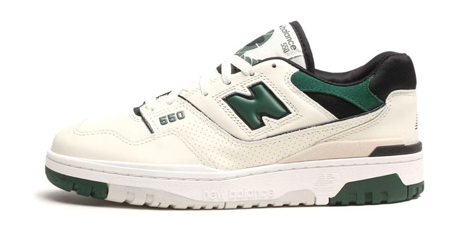 New Balance 550 sneakers in white with green detail