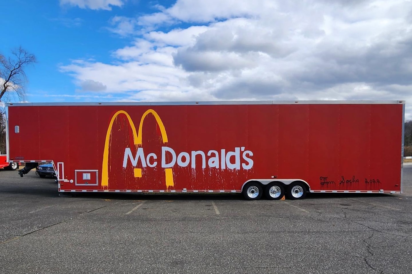 Tom Sachs Reveals New McDonald's Public Art trailer new milford max power motors happy meal graffiti spray paint