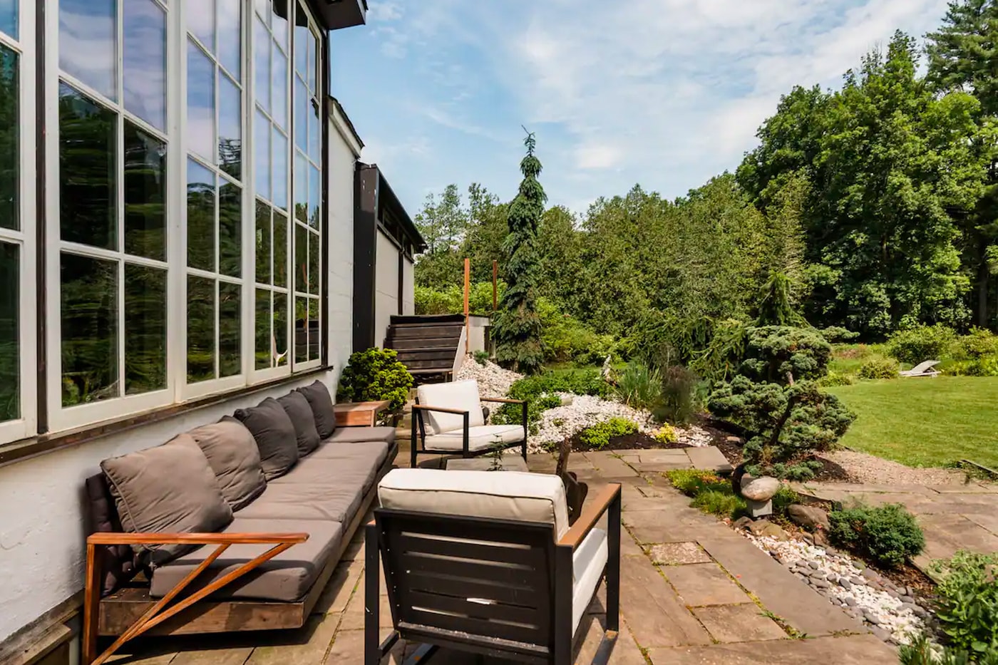 Airbnb Home Rental Woodstock New York The Pond House Historic Artist Estate Waterfall Mid-Century Modern Interior Design