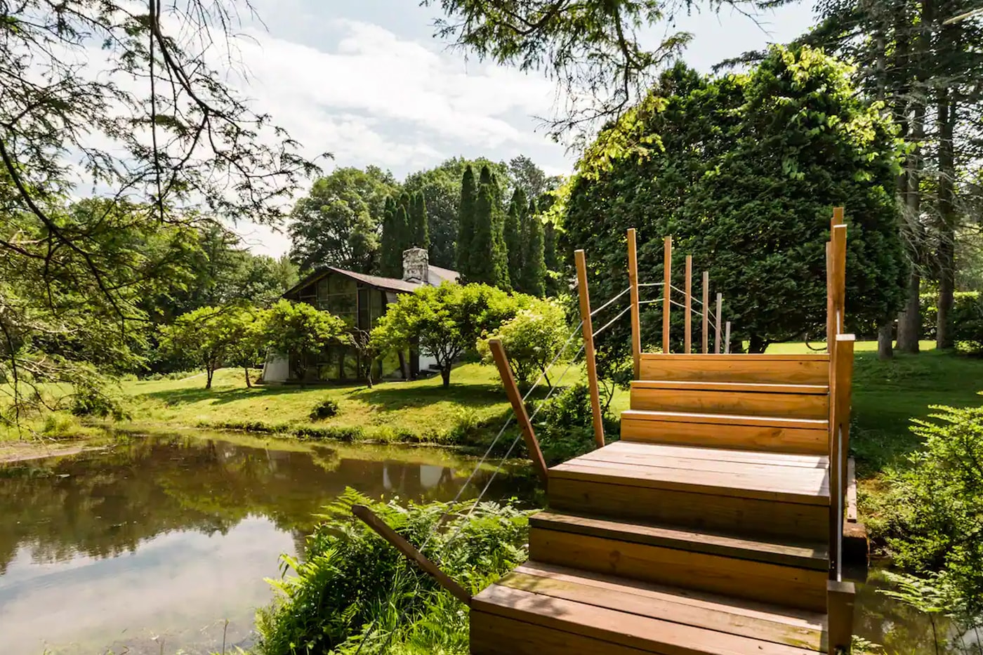 Airbnb Home Rental Woodstock New York The Pond House Historic Artist Estate Waterfall Mid-Century Modern Interior Design