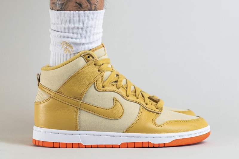 On-Feet Look at Nike Dunk High "Gold Canvas" DV7215-700 release info team gold wheat gold safety orange white high top basketball