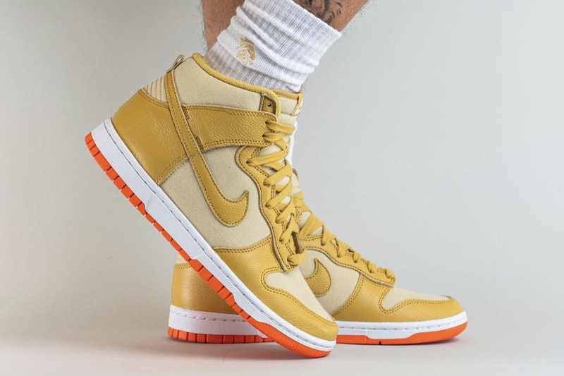 On-Feet Look at Nike Dunk High "Gold Canvas" DV7215-700 release info team gold wheat gold safety orange white high top basketball
