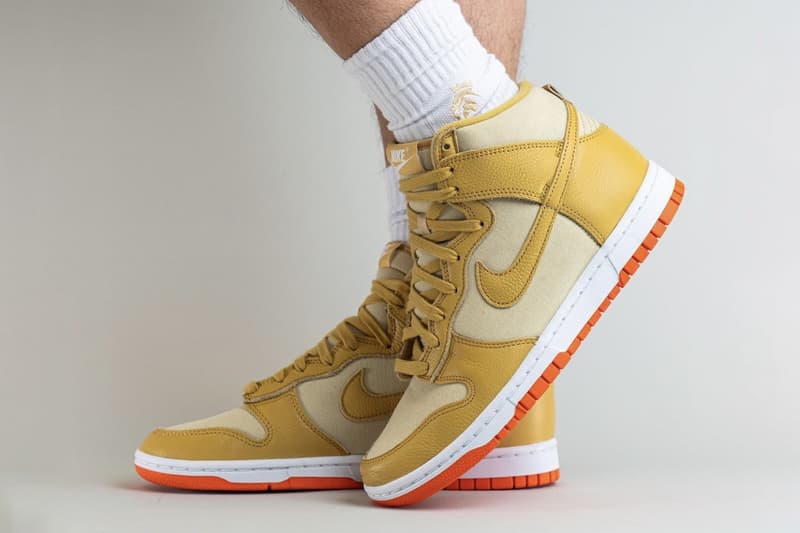 On-Feet Look at Nike Dunk High "Gold Canvas" DV7215-700 release info team gold wheat gold safety orange white high top basketball