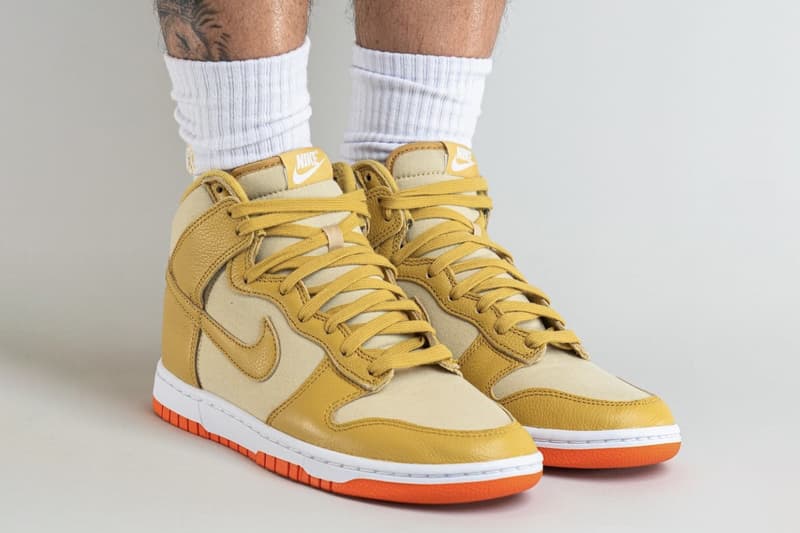 On-Feet Look at Nike Dunk High "Gold Canvas" DV7215-700 release info team gold wheat gold safety orange white high top basketball