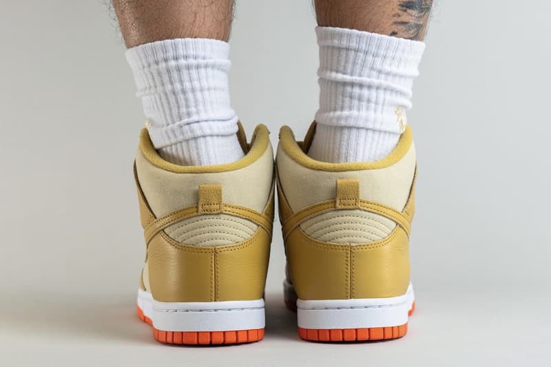 On-Feet Look at Nike Dunk High "Gold Canvas" DV7215-700 release info team gold wheat gold safety orange white high top basketball