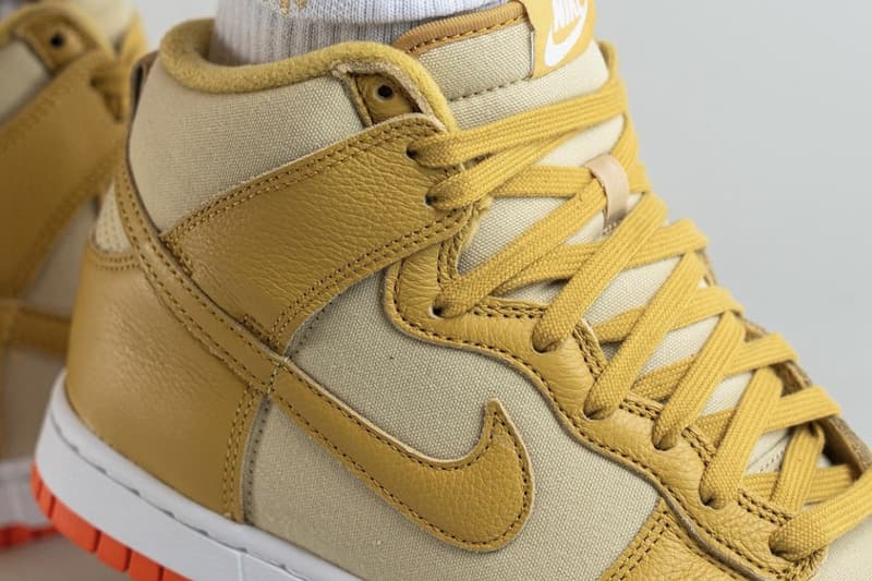 On-Feet Look at Nike Dunk High "Gold Canvas" DV7215-700 release info team gold wheat gold safety orange white high top basketball