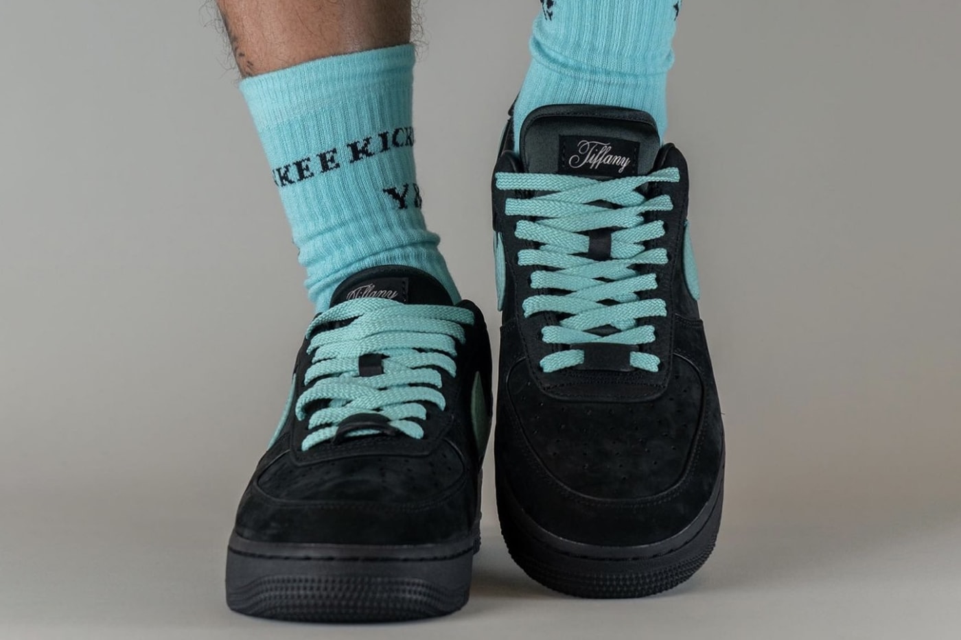 Take an On-Feet Look at the Tiffany & Co. x Nike Air Force 1 Low Collaboration DZ1382-001 black tiffany blue af1 swoosh suede leather lebron james 