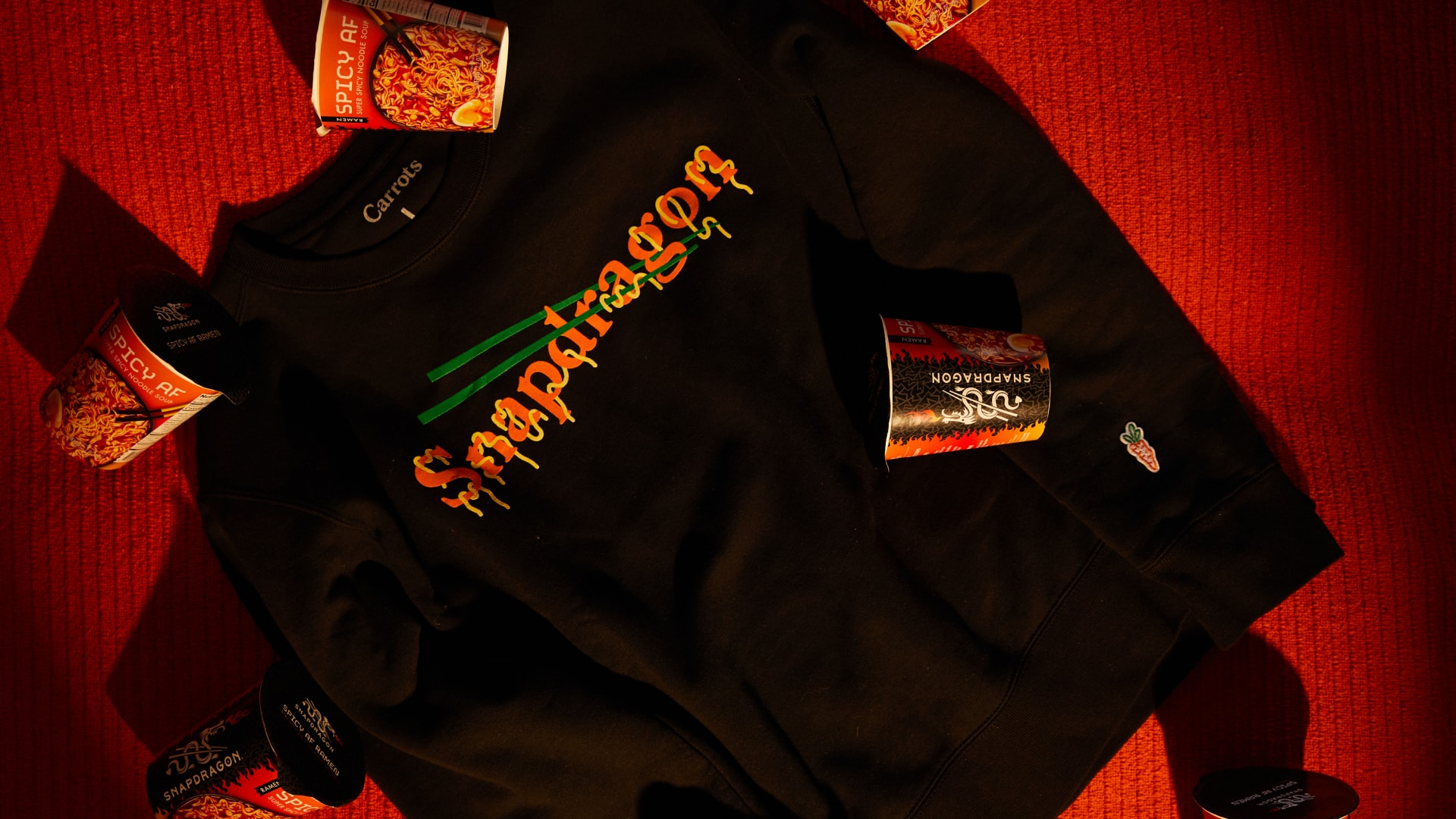 Snapdragon and Carrots Sweatshirt Collaboration black orange green streetwear hypebeast giveaway instant noodles ramen soo