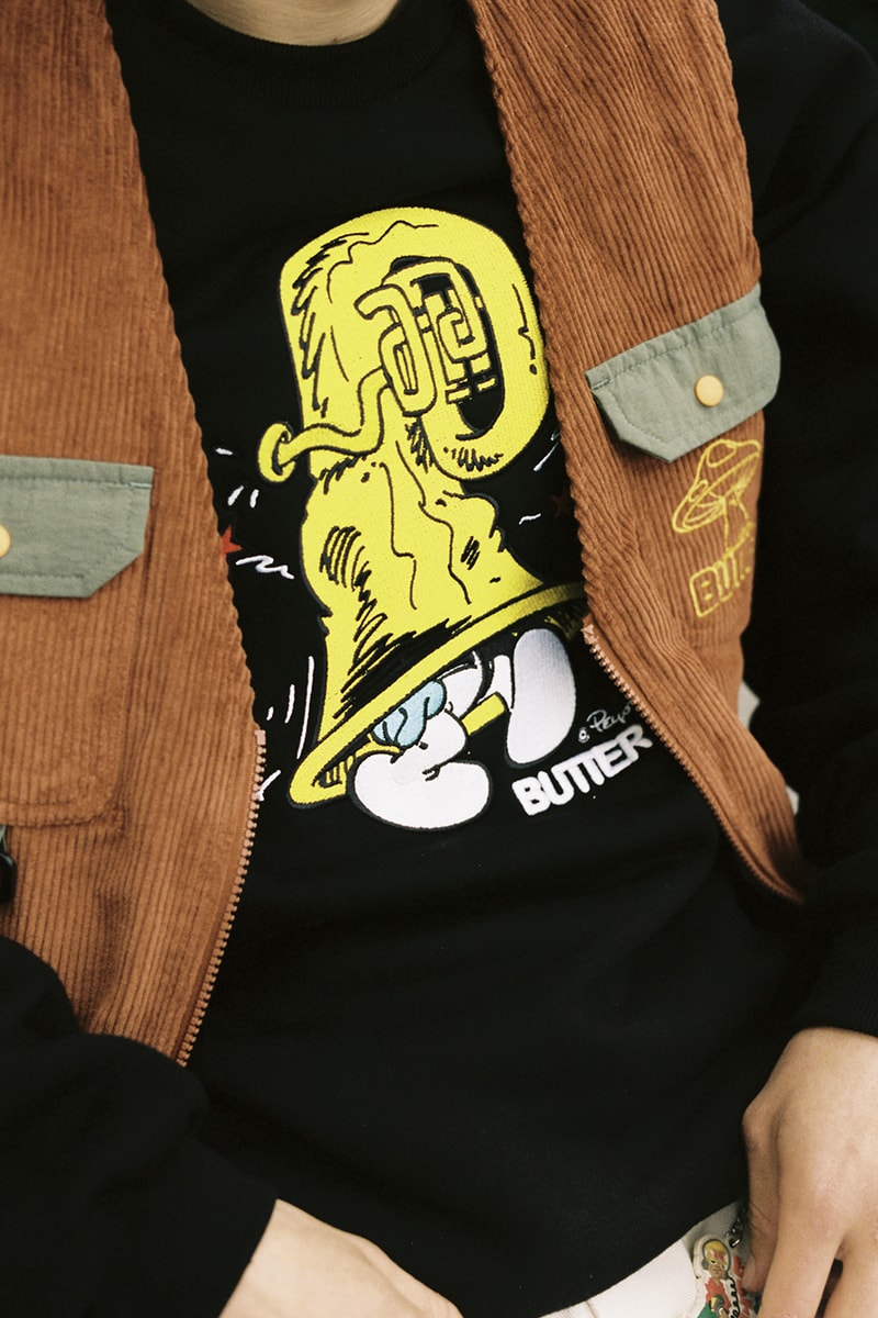 Butter Goods Enlists 'The Smurfs' for a Nostalgic Capsule collaboration cartoon australia brand 90s blue t-shirts sweaters graphics