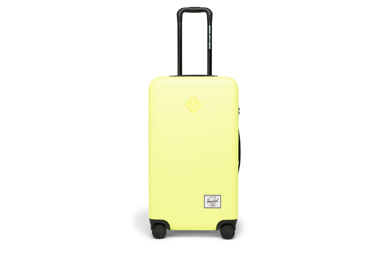 Herschel Releases Heritage Inspired Luggage Capsule carry on trunk suitcase black pink yellow blue gray 