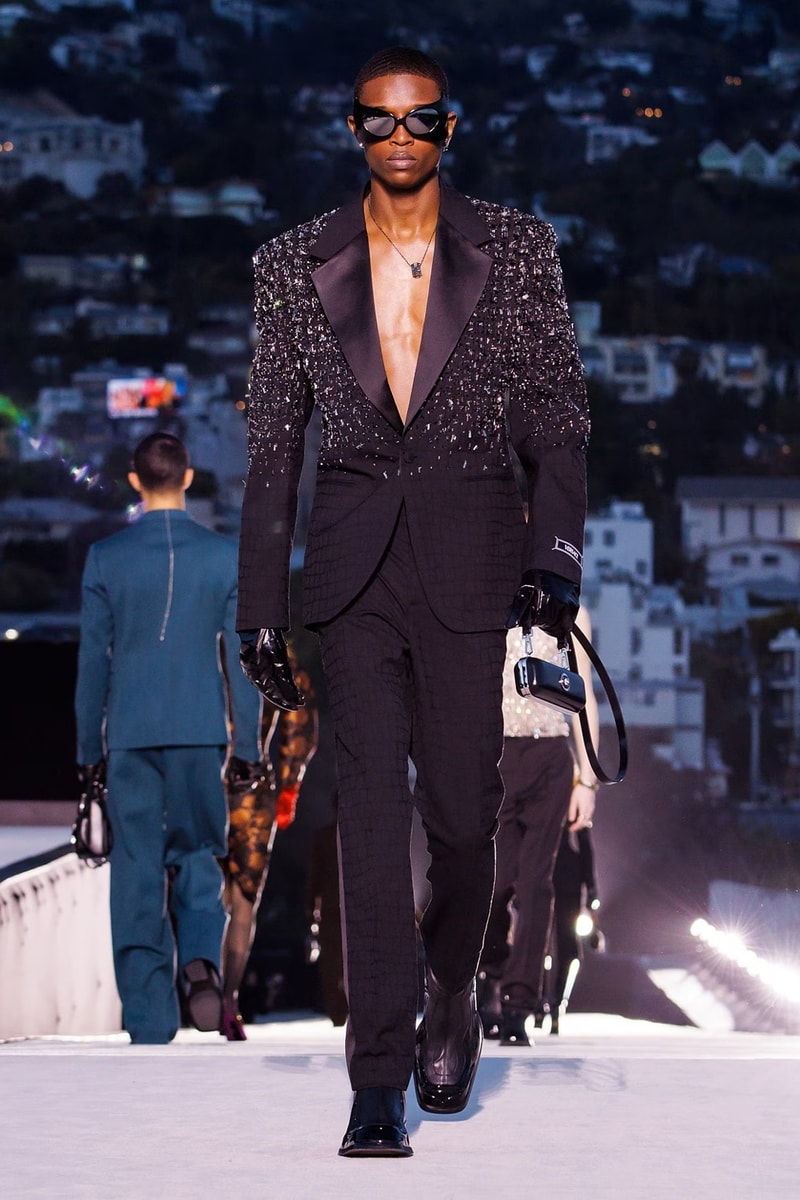 A model wears a creation part of the Gianni Versace Fall/Winter