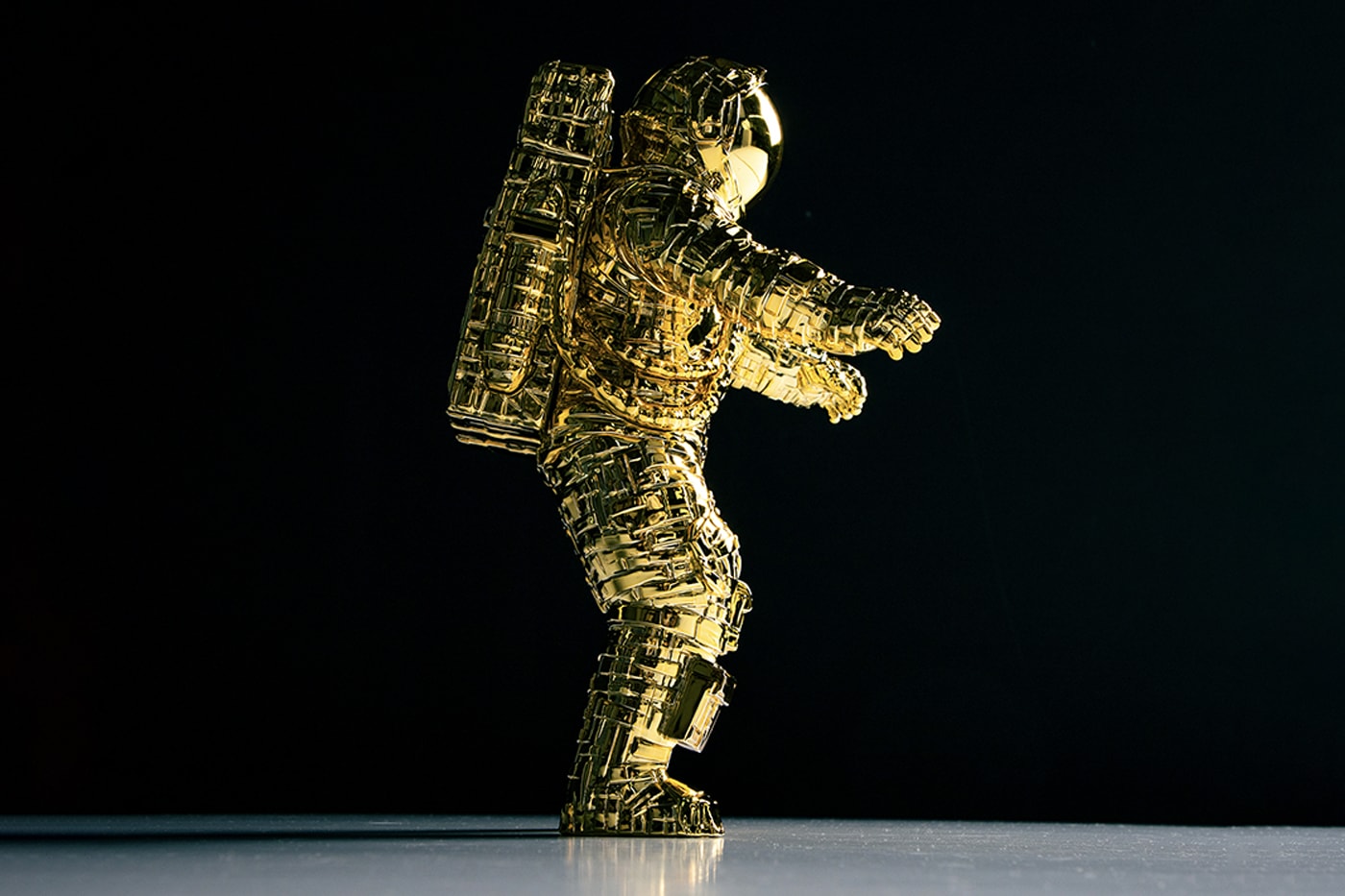 Pharrell's Billionaire Boys Club Unveils Limited Edition Astronaut Sculpture by Michael Kagan gold chrome colorways