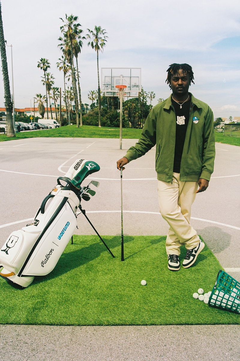 undefeated malbon golf collection apparel hoodie tee shirt long sleeve bag head cover bucket hat varsity jacket