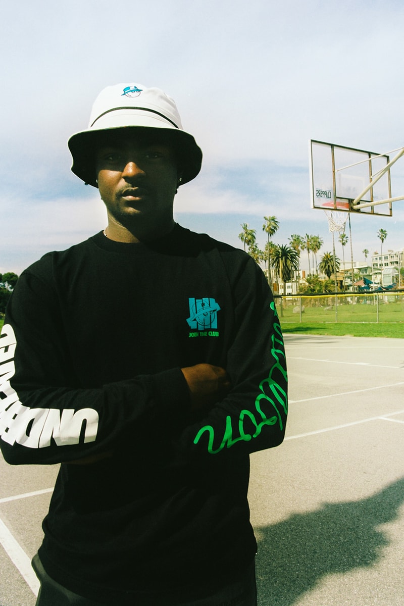 undefeated malbon golf collection apparel hoodie tee shirt long sleeve bag head cover bucket hat varsity jacket