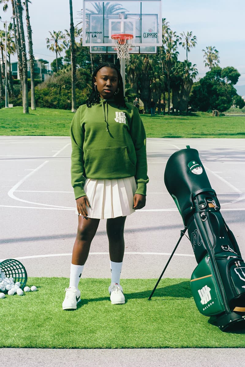 undefeated malbon golf collection apparel hoodie tee shirt long sleeve bag head cover bucket hat varsity jacket