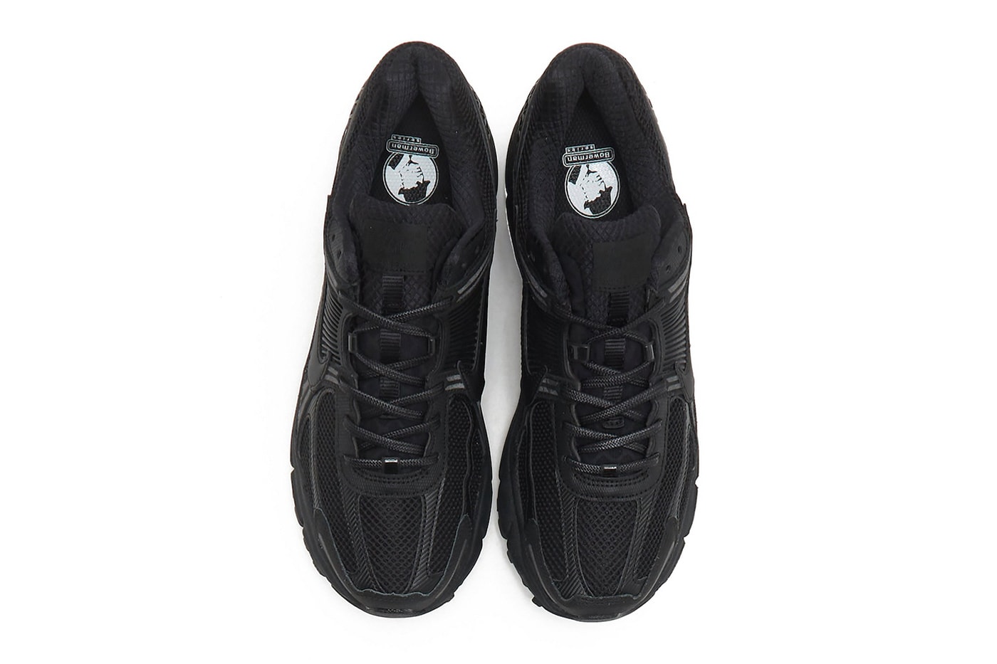 First Look at the Nike Zoom Vomero 5 "Triple Black" Black/Black-White releasing 2023 sleek black everyday sneakers shoes nike swoosh all black